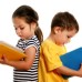 Девочка и мальчик читают книгу